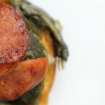 Crostini with Sausage and Braised Greens